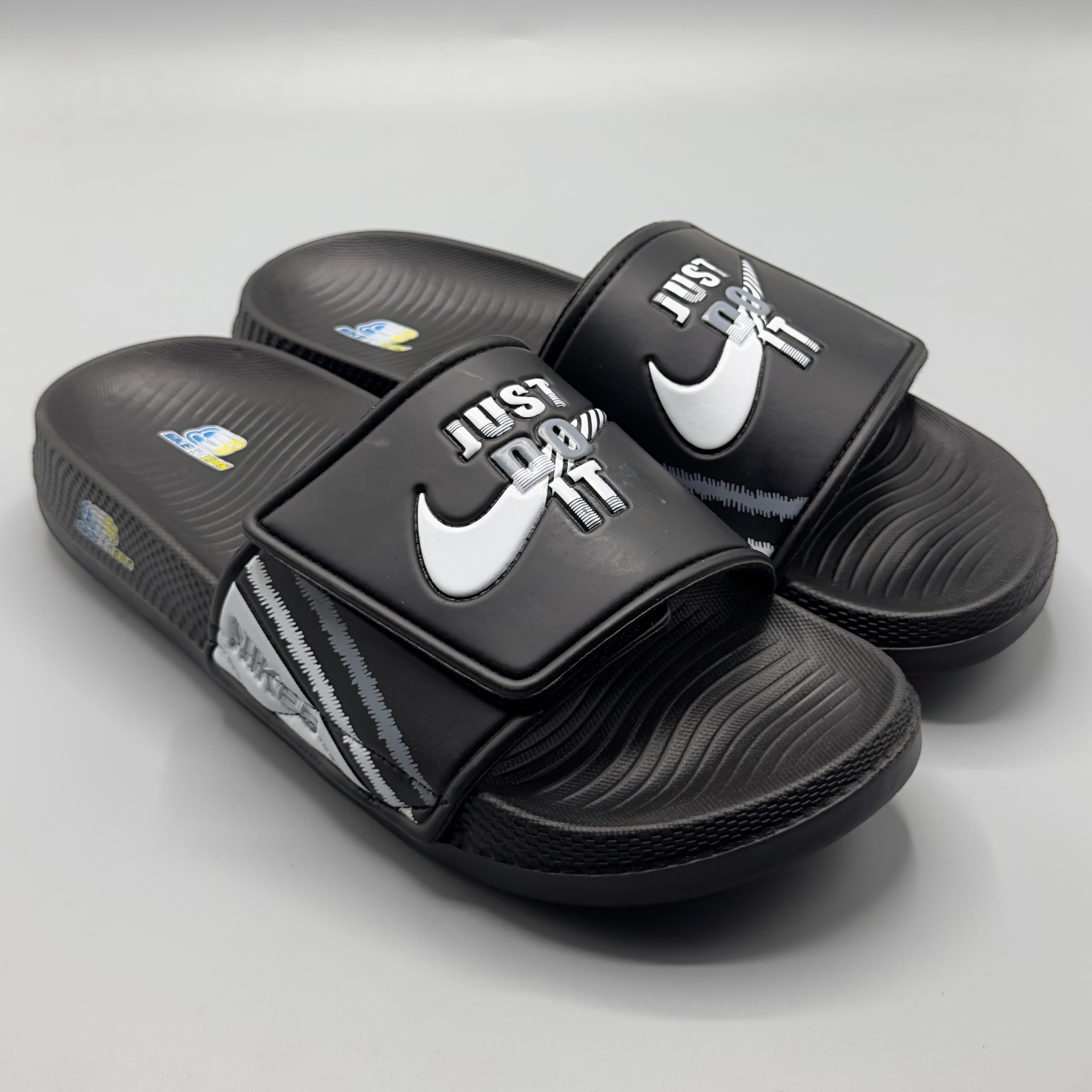 Black , Black men sports slippers with durable anti-slip outsole for indoor and outdoor wear.