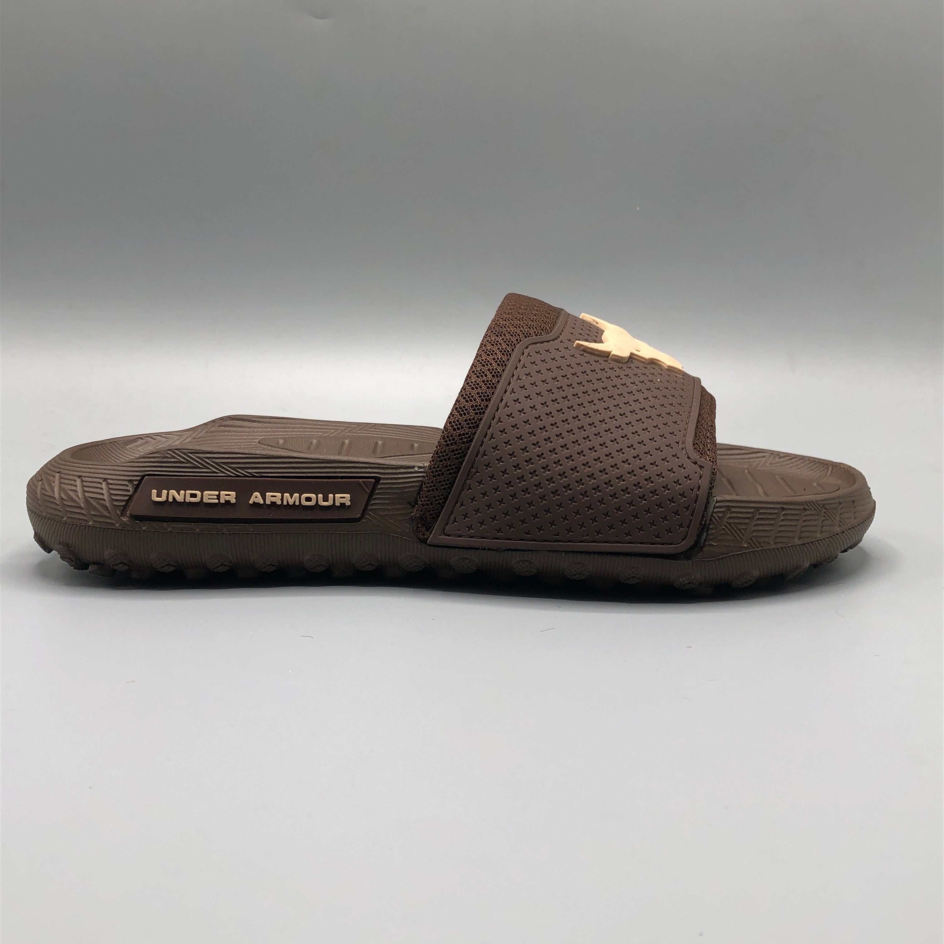 PowerFlex Comfort Slides anti-slip outsole pattern for secure everyday wear, Brown