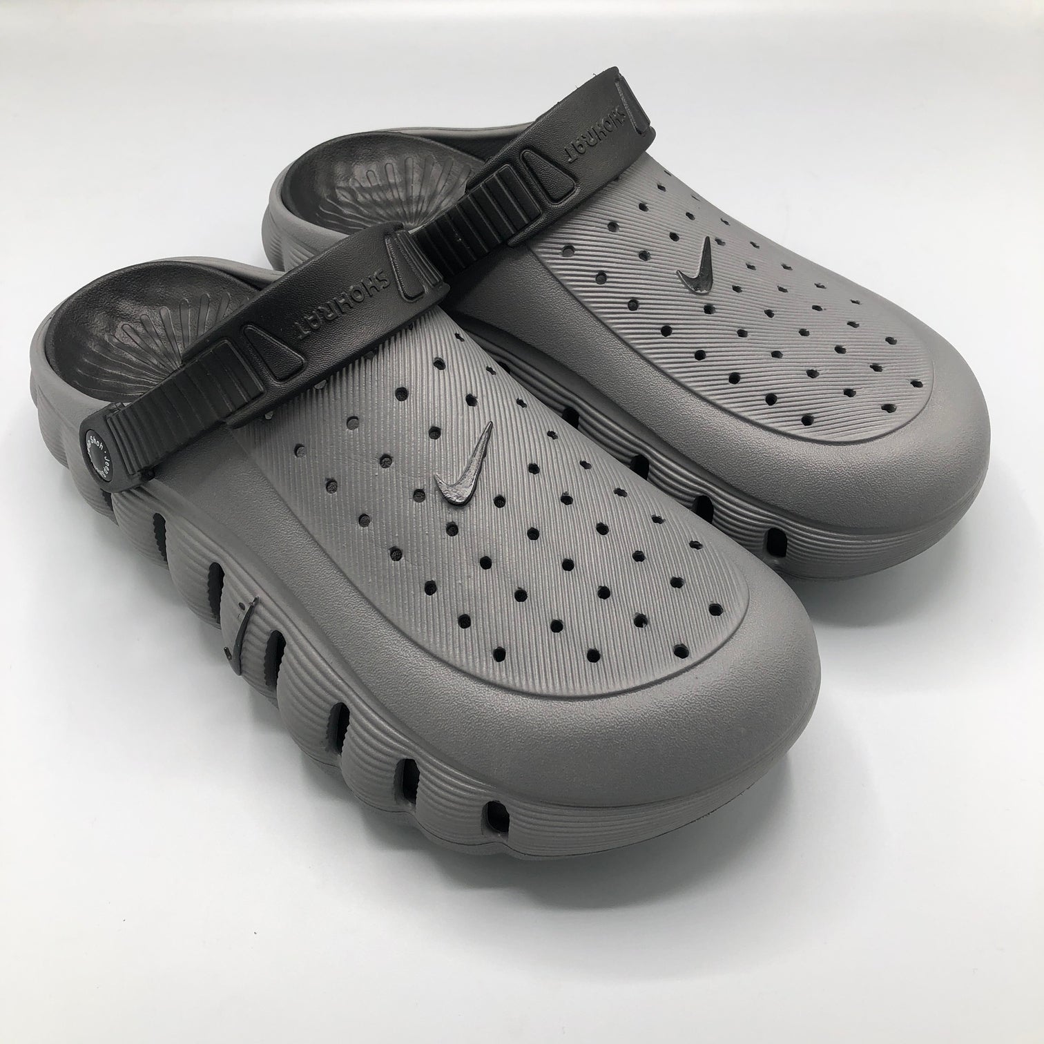 Gray , Grey chunky foam Top angled view of grey molded EVA mule slipper highlighting the textured anti-slip footbed
